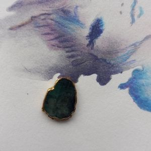 Raw emerald & gold pendant